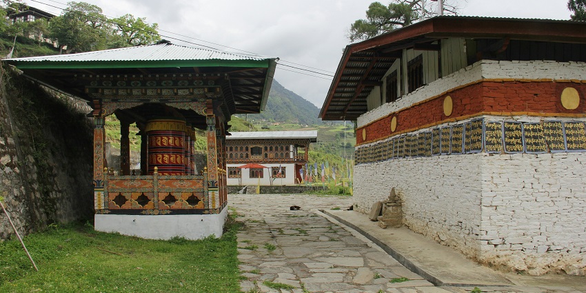 raditional Buddhist temple in Phobjikha Valley in Bhutan with vibrant exterior decorations.