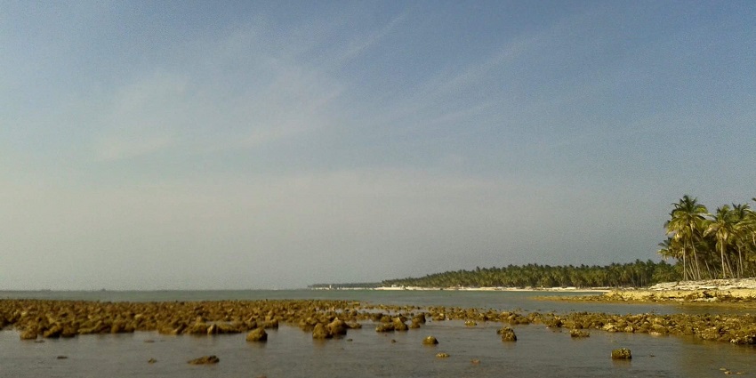 Vast view of the beach against the clear blue sky