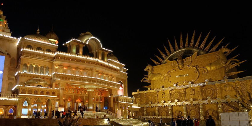 Majestic view of the Kingdom of dreams at night, illuminated by warm lights