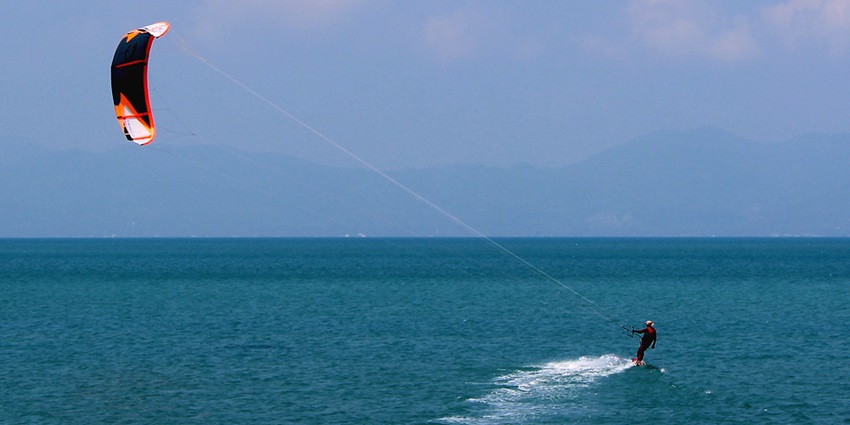 Kite surfing is one of the most amazing and thrilling water sports in Thailand for all.