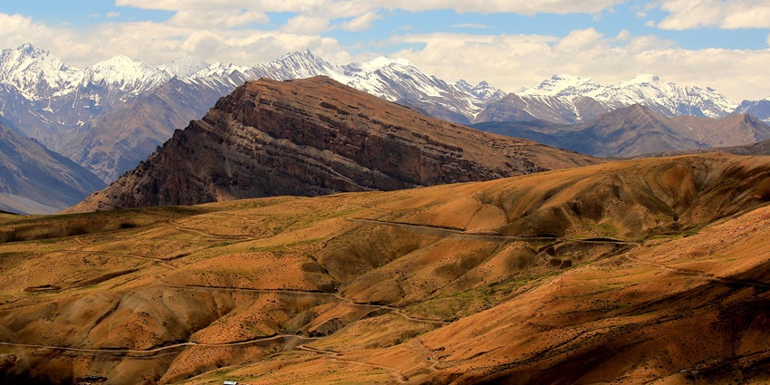 Komic Village in Spiti Valley with traditional houses and mountain views, showcasing the beauty of Himachal