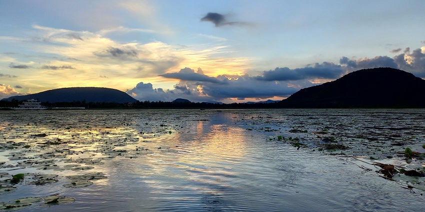 Sunset view from Kondakarla Ava lake. Explore the majestic view of Andhra on trip