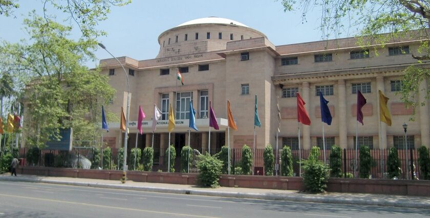 View of one of the Kota museums, surrounded by trees and colourful flags