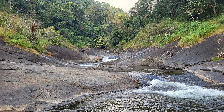 A picture of a waterfall in Visakhapatnam taken from the top