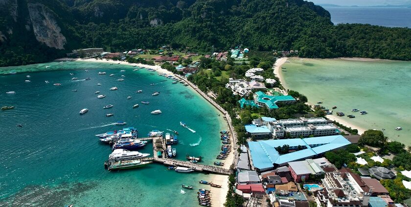 Aerial view of an Islands, showcasing lush greenery and vibrant water - Krabi island nightlife.