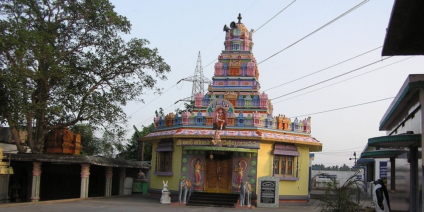 A picture of a traditional temple with ancient Hindu designs and intricate architecture