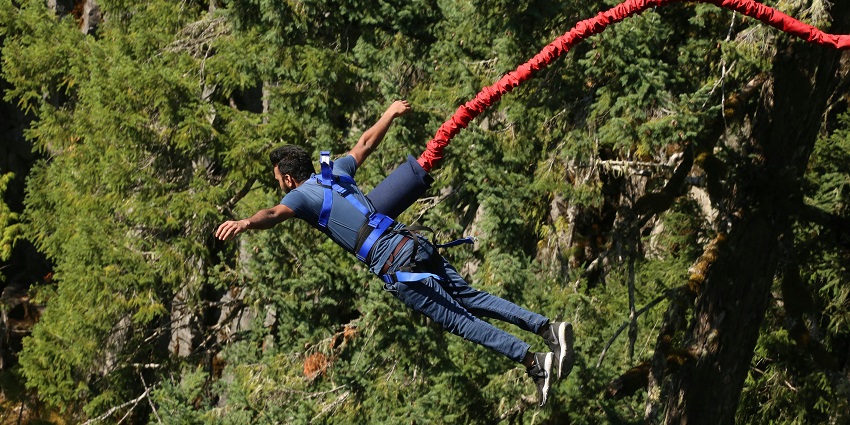 Bungee jumper on a platform in the Kusma Valley, a bungee jumping location in Kathmandu.