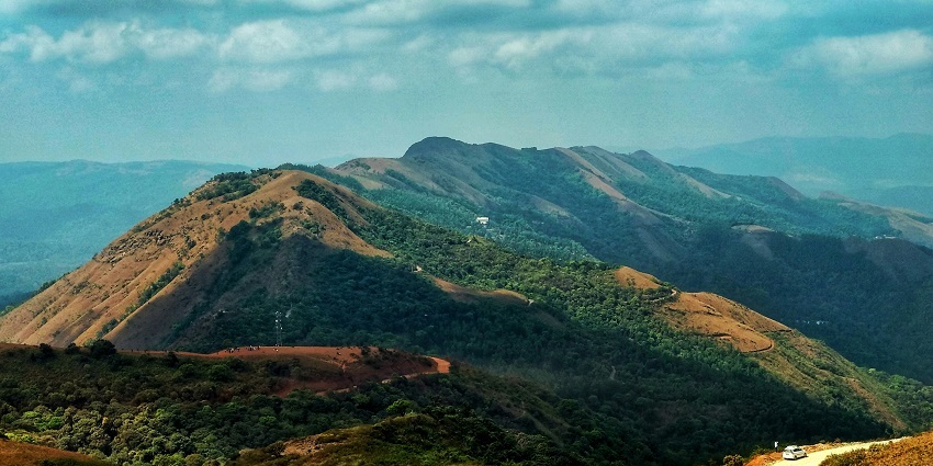 The Chikmagalur hill station, is known for its misty mountains and undulating grasslands.