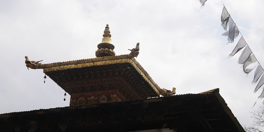 Kyichu Lhakhang temple surrounded by verdant landscapes in the Paro Valley.