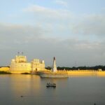 Lakhota Palace and Museum surrounded by water.