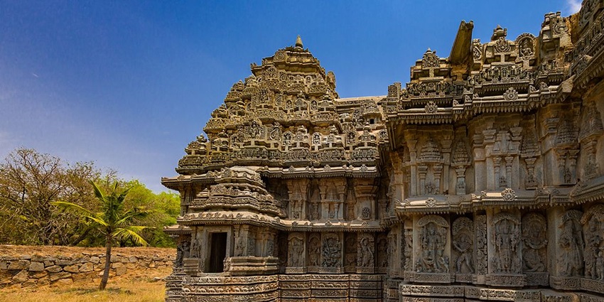 Stone Lakshmi temple in Puri featuring intricate carvings on its exterior.