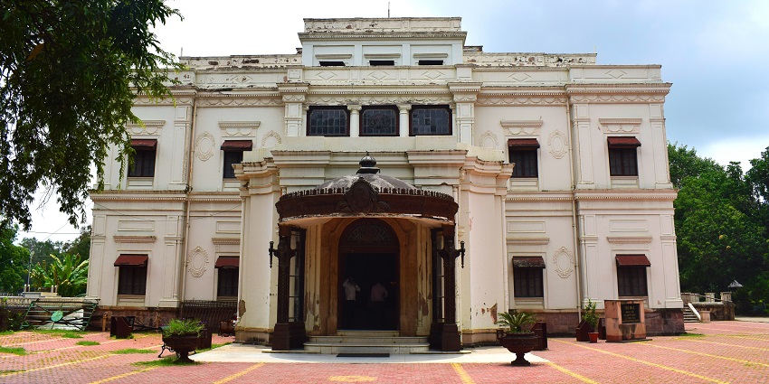 A view of Lal Bagh Palace in Indore, highlighting its elegant European-style architecture.