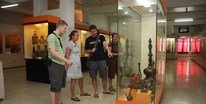 Visitors exploring exhibits at Lalbhai Dalpatbhai Museum, showcasing cultural artefacts.