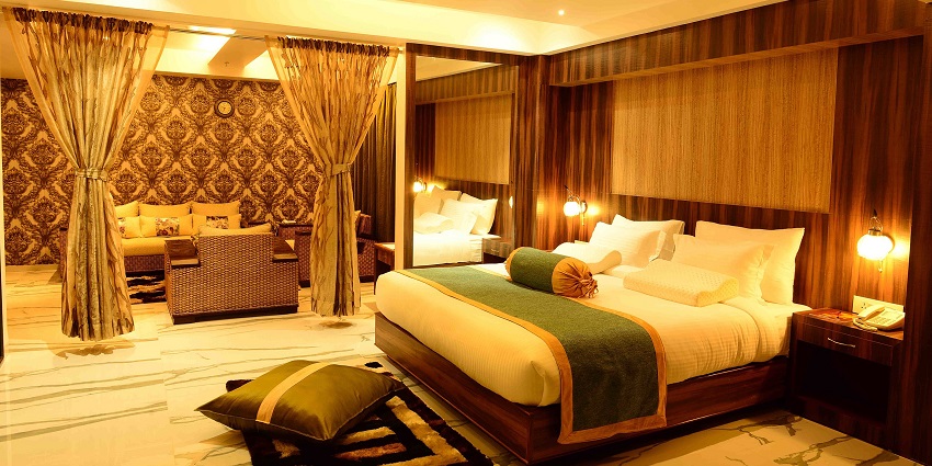 A luxurious room in Lalgarh Palace, one of the historical and heritage hotels to visit.