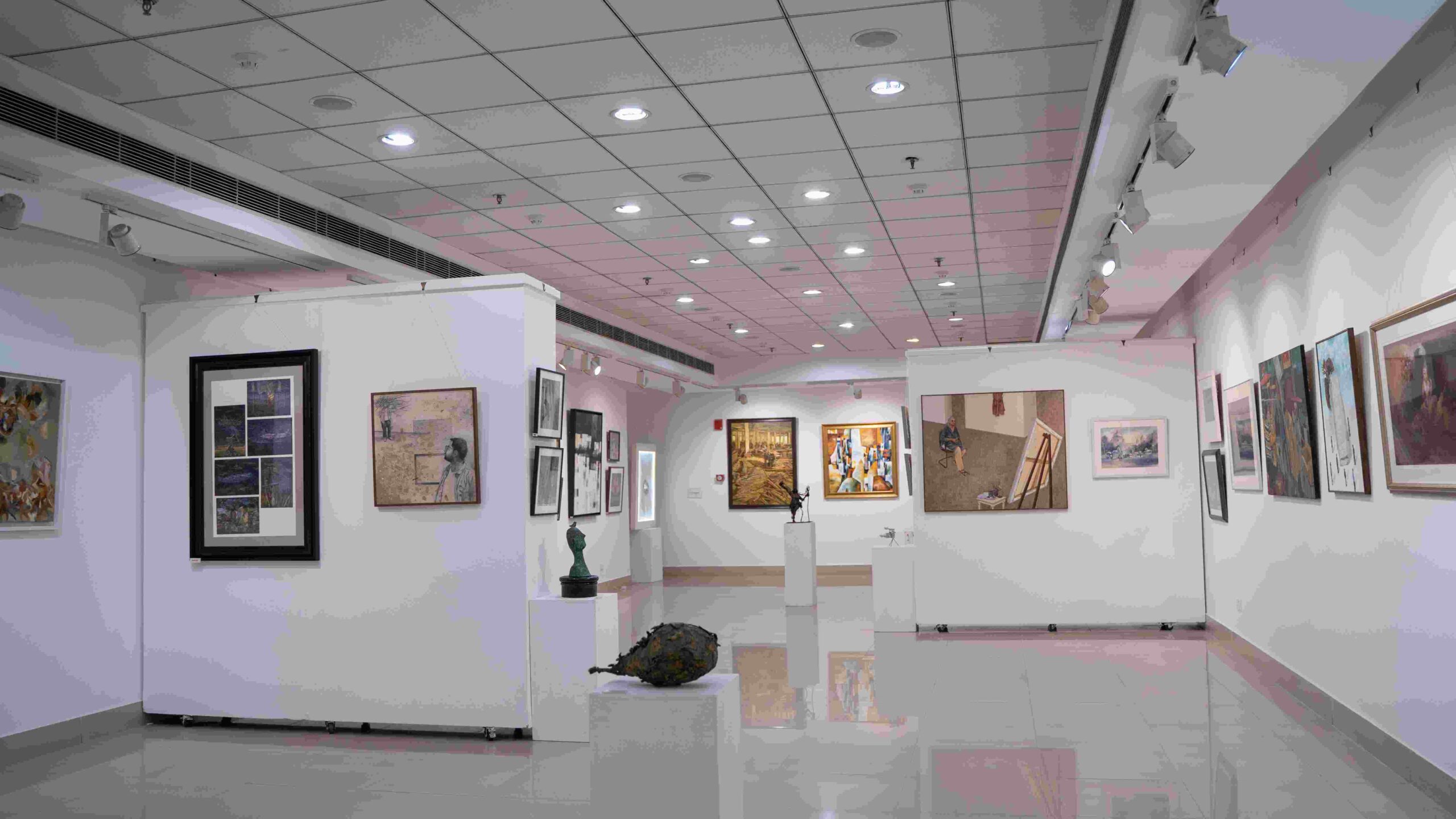 An image of Lalit Kala Akademi displaying modern art exhibitions and vibrant artworks.