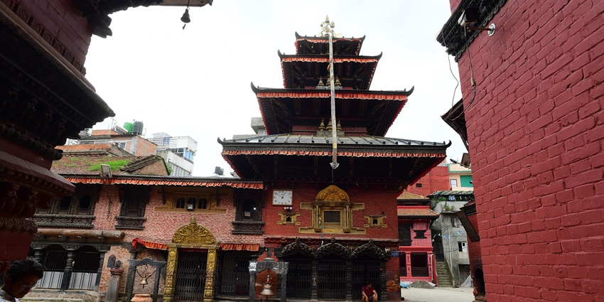 Harisiddhi Temple in Lalitpur, Nepal, featuring traditional architecture and vibrant areas.