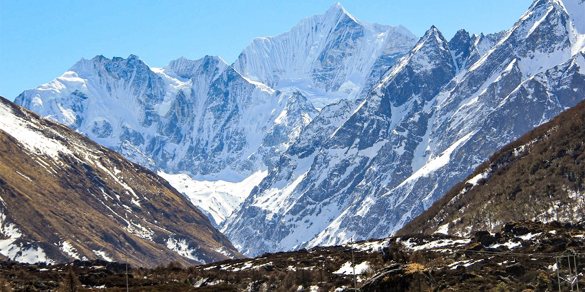 View of Langtang Valley near Kyanjin Gumba, with the stunning backdrop of mountains.