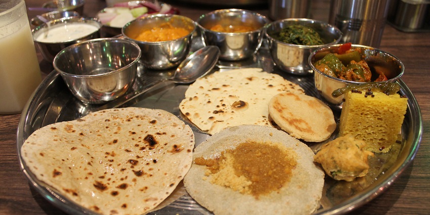 LMB Jaipur, since 1954, serves authentic Rajasthani thali and sweets to all travellers.