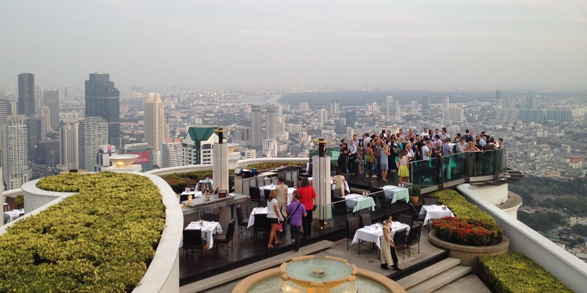Lebua bar with people dancing and enjoying the Bangkok nightlife for couples