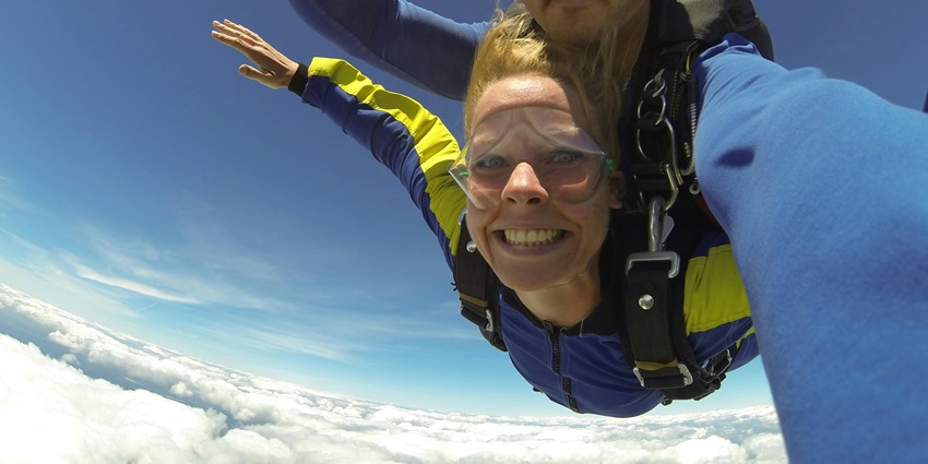 Couples enjoying levels of skydiving in Nepal, such as tandem, solo, and AFF.
