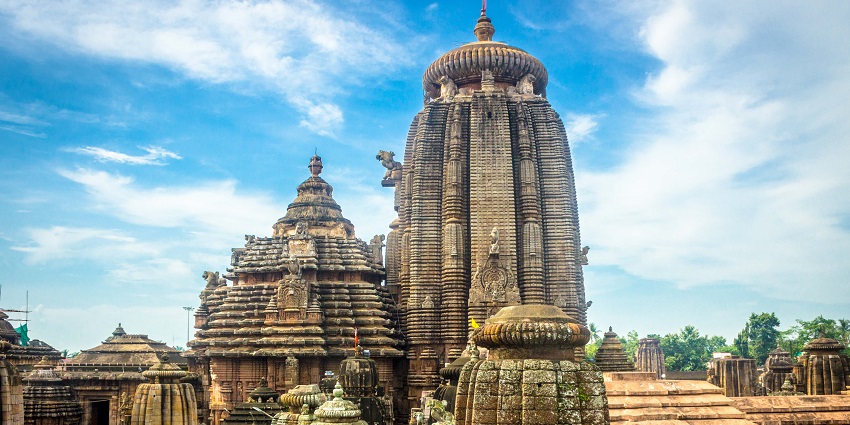 The Bhubaneswar temple, Lingaraja features detailed carvings and tall towers.