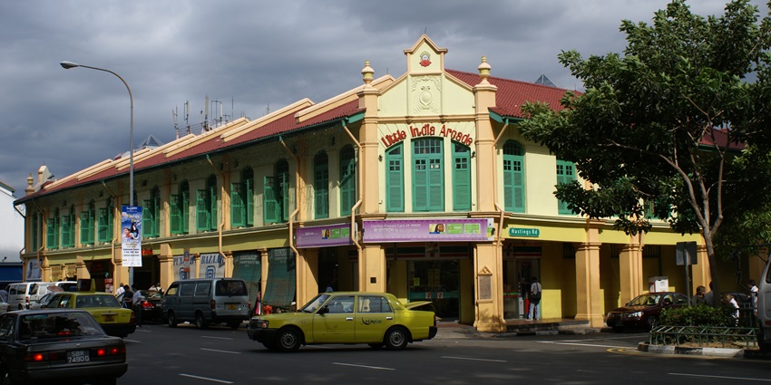 A picture of a market arcade in Singapore taken on a cloudy day from across the street
