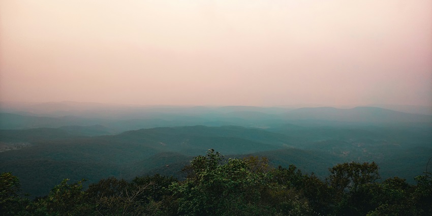 A scenic view of Similipal National Park in Odisha justifying its serene location.