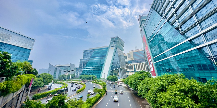 Picturesque view of tall builds and beautiful infrastructure in DLF Cyber City hub with bustling traffic