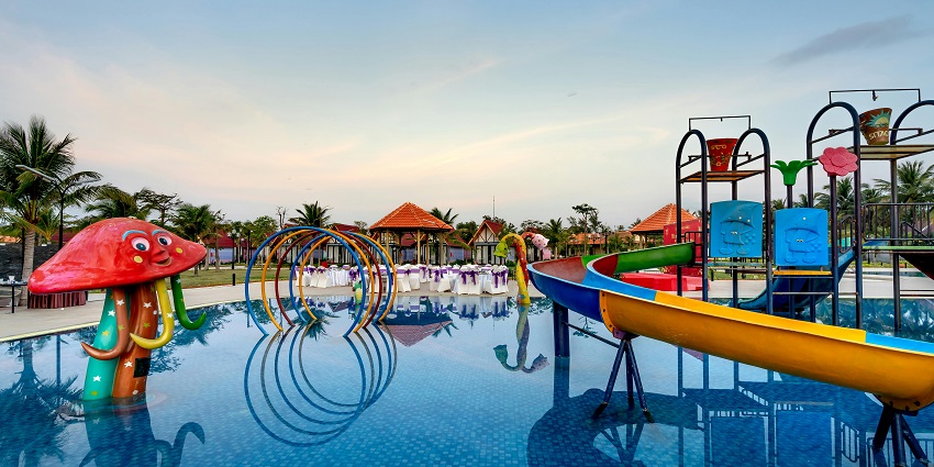 Picturesque view of colourful water slides in the swimming pool of the park