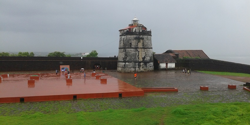 Distant view of the fort on a rainy day surrounded by lush landscapes
