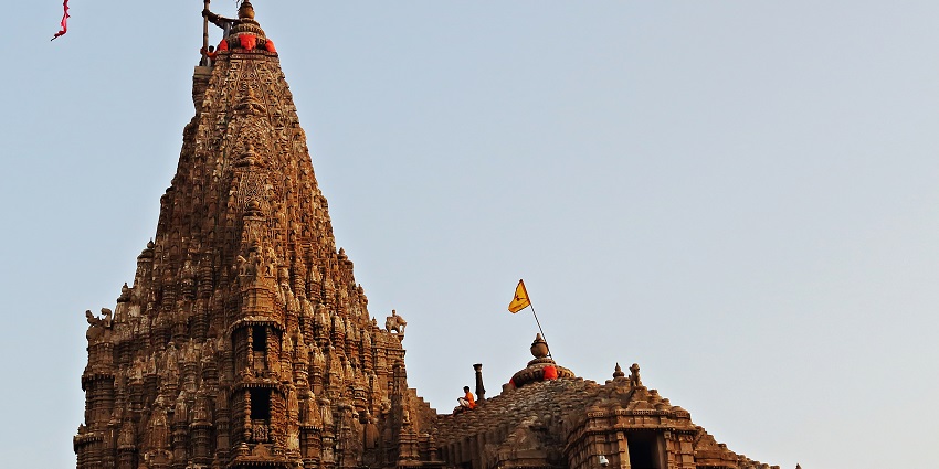 A view of the five-storey tall tower of Dwarkadhish Temple, an architectural marvel.