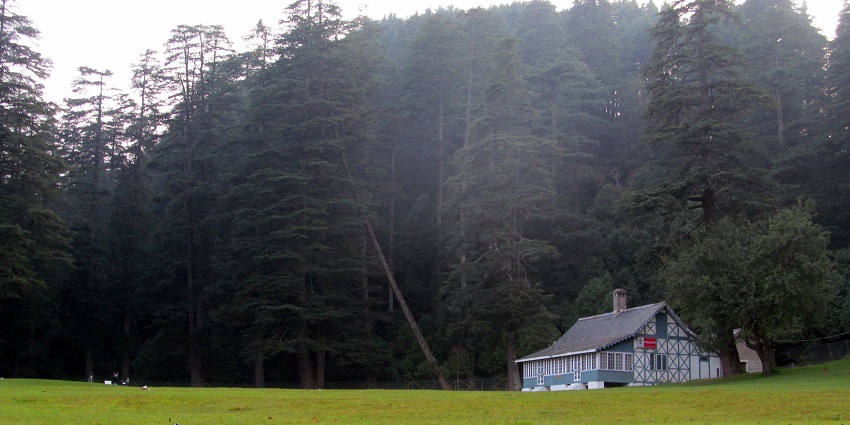 An image of lush green landscapes in Khajjiar, located in the state of Himachal Pradesh.
