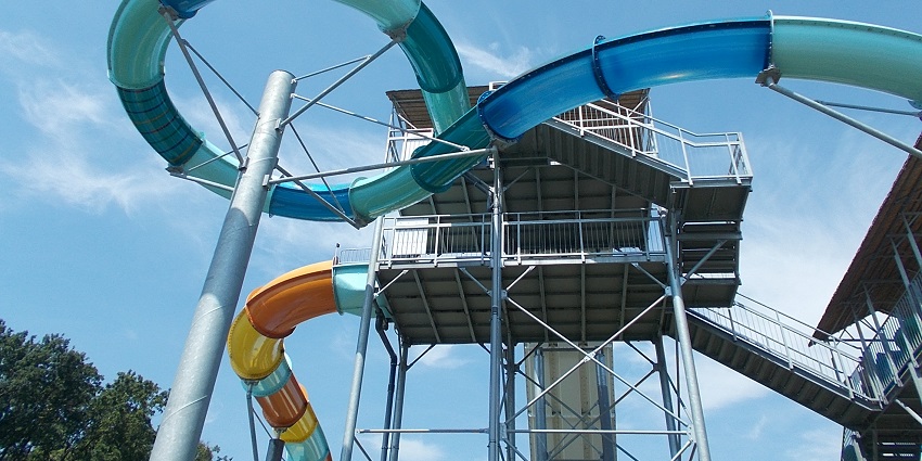 View from the pool the high water slides during broad day time and clear blue sky summer time