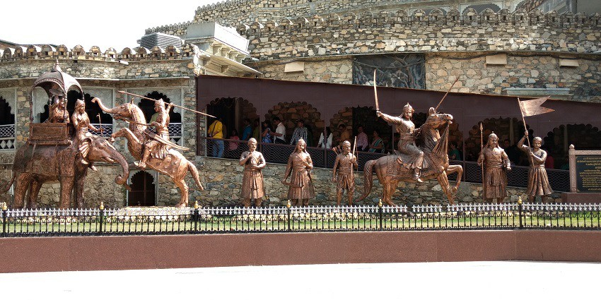 Wide angle shot of a beautiful copper sculpture honoring the battle of Haldighati