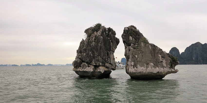 Tuan Chau Island is present in the Ha Long Bay amidst emerald waters.