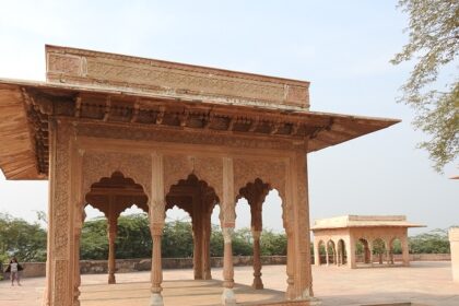 A breathtaking view of the Lohagarh Fort with breathtaking views of a waterbody.