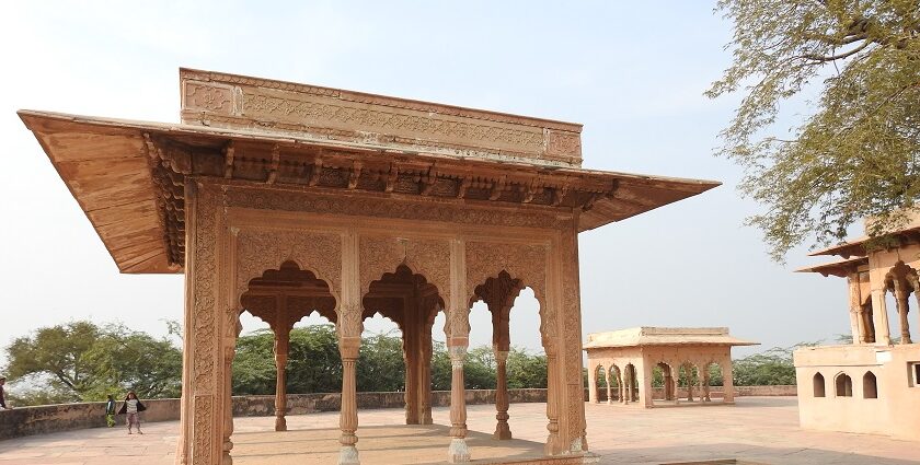 A breathtaking view of the Lohagarh Fort with breathtaking views of a waterbody.