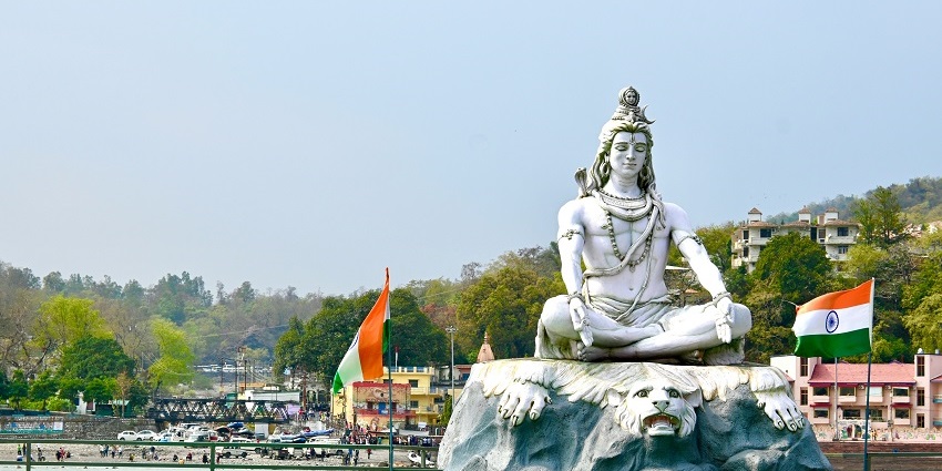 Statue of Lord Shiva on the banks of Ganga, Rishikesh - places to visit in November near Delhi.
