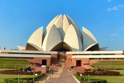 A stunning view of the Lotus Temple, showcasing its unique flower-like architecture.