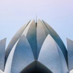 A scenic glimpse of the Lotus Temple, a famous tourist attraction in the region.