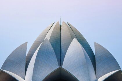 A scenic glimpse of the Lotus Temple, a famous tourist attraction in the region.