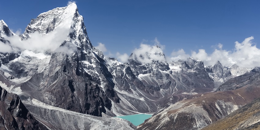 Snow-capped mountains in Nepal, showcasing a beautiful view of Nepal in winter.