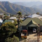 Image of serene hills lush greenery in Mizoram, capturing the region's natural beauty.