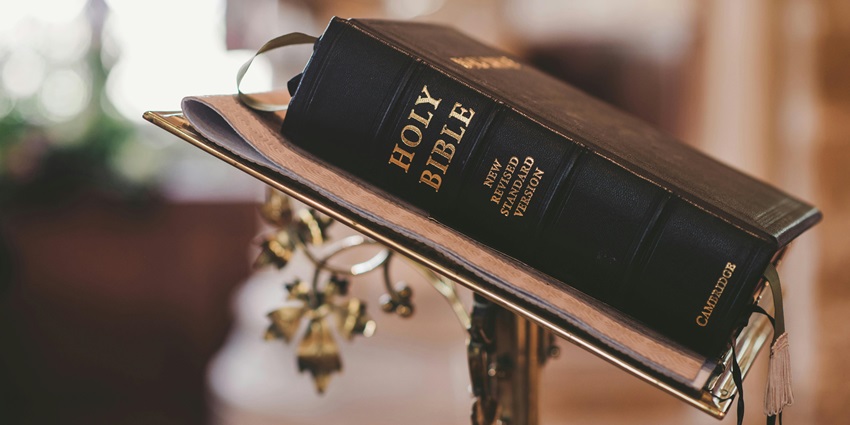 Image of a Holy Bible on Stand - explore Machilipatnam Church - one of the best places to see in Machilipatnam