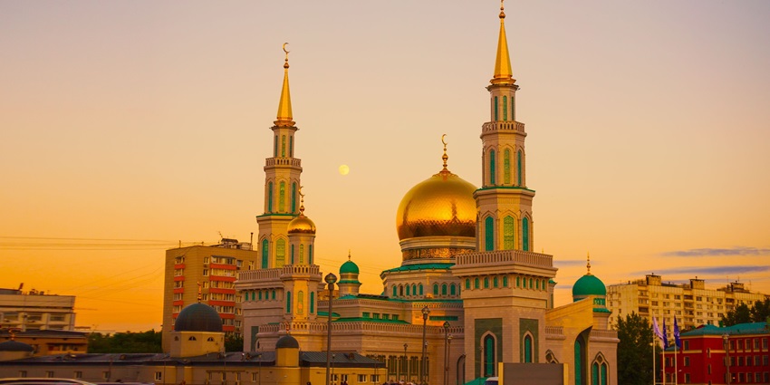Silhouette of mosque buildings at sunset, showcasing the popular mosques in Nepal.