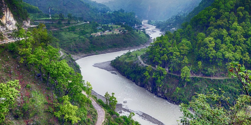 Mahakali River has crystal clear waters gliding through beautiful landscape.