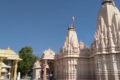 A stunning Jain temple in Gujarat, India, showcasing intricate architecture - Mahudi Temples