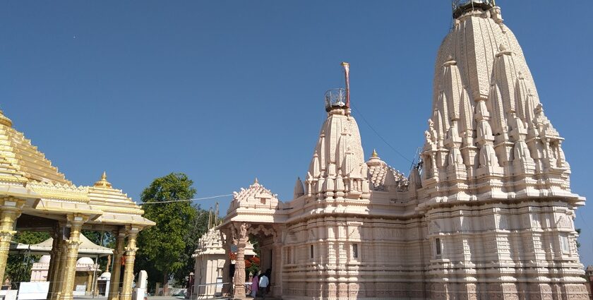 A stunning Jain temple in Gujarat, India, showcasing intricate architecture - Mahudi Temples