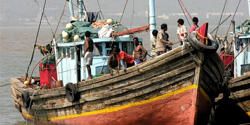 Fishermen at Mahul Jetty, showcasing Mumbai's traditional fishing practices.