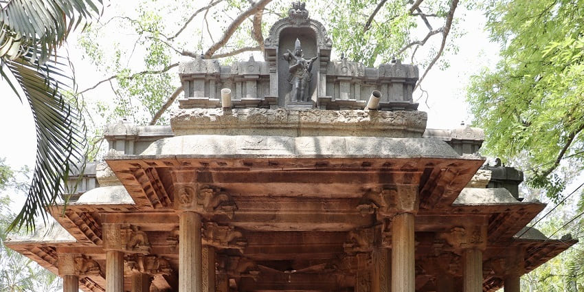 Mandapa near Srivari Padalu, showcasing intricate architecture and serene surroundings.